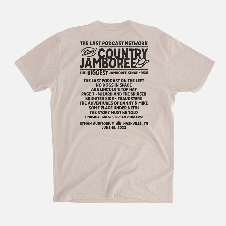 photo of country jamboree tee with devil character playing guitar in center. country jamboree in large font surrounding. ryman auditorium nashville , tn  at bottom. the last podcast network at top.