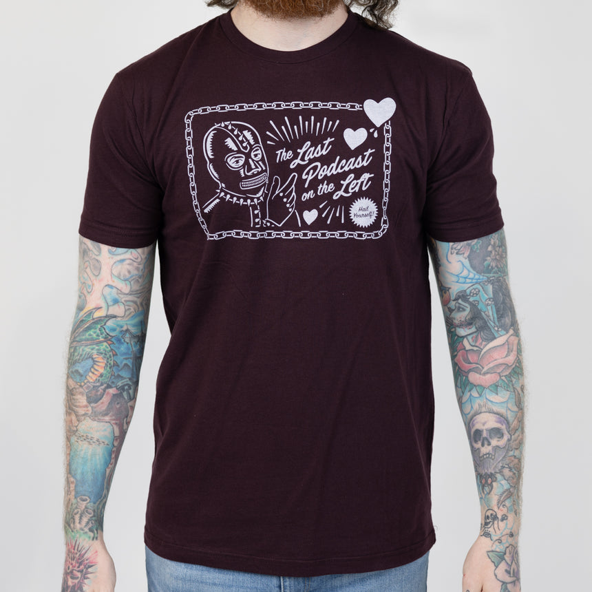 Oatmeal tee with graphic of pagan skull with text "LPOTL THE LAST PODCAST ON THE LEFT"