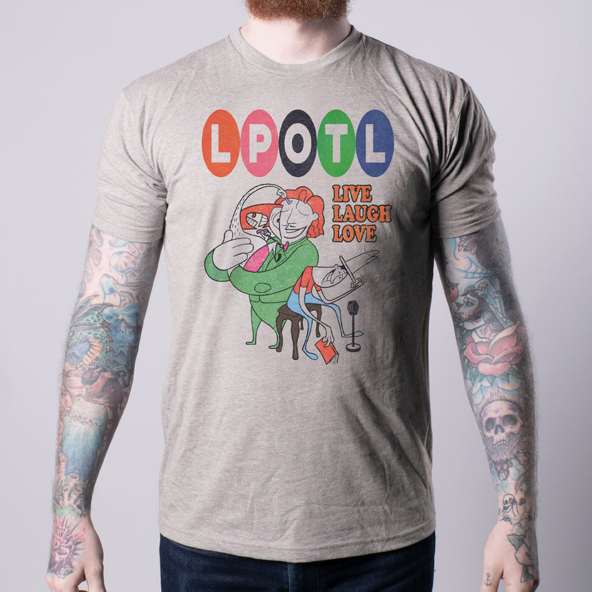 man in oatmeal tee shirt with colorful vintage graphic and Text "LPOTL LIVE LAUGH LOVE"