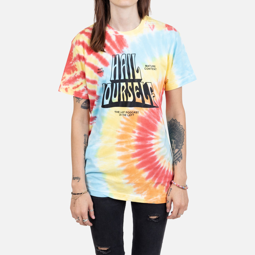 Tie dye tee laid flat with Black text on front "HI-FI AUDIO HAIL YOURSELF MATURE CONTENT THE LAST PODCAST ON THE LEFT"