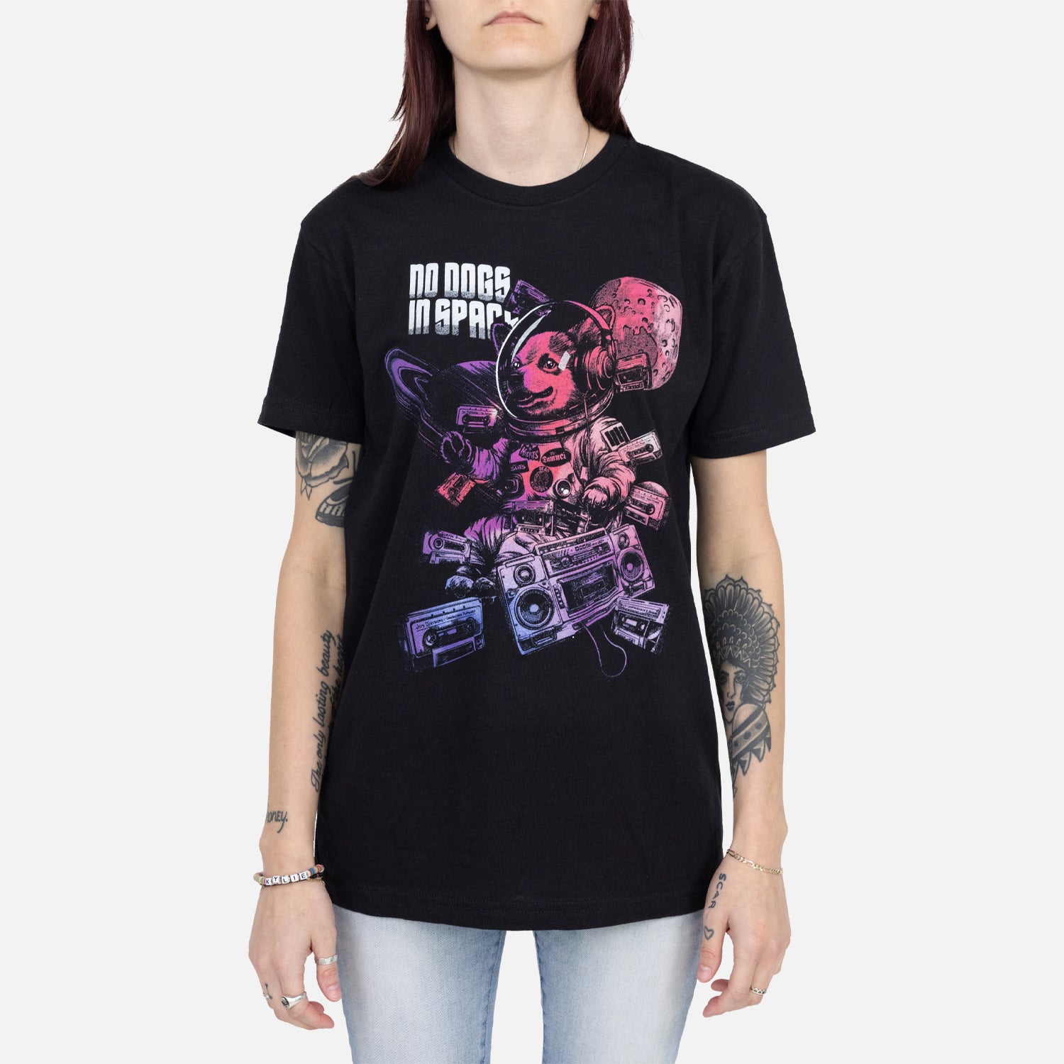 black shirt on female model with text "NO DOGS IN SPACE" with graphic of dog in space suit with boombox