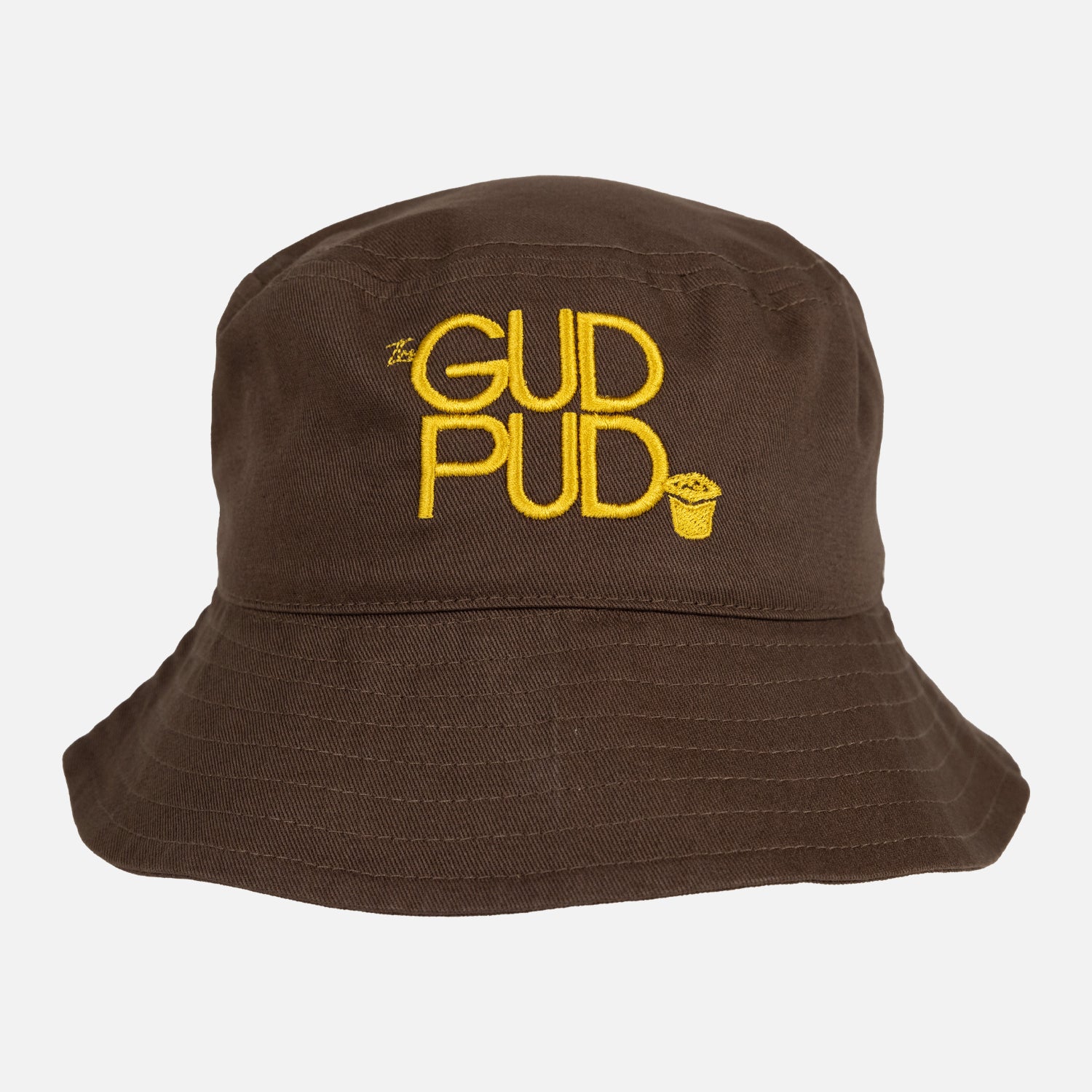brown bucket hat with yellow embroidered text "GUD PUD"