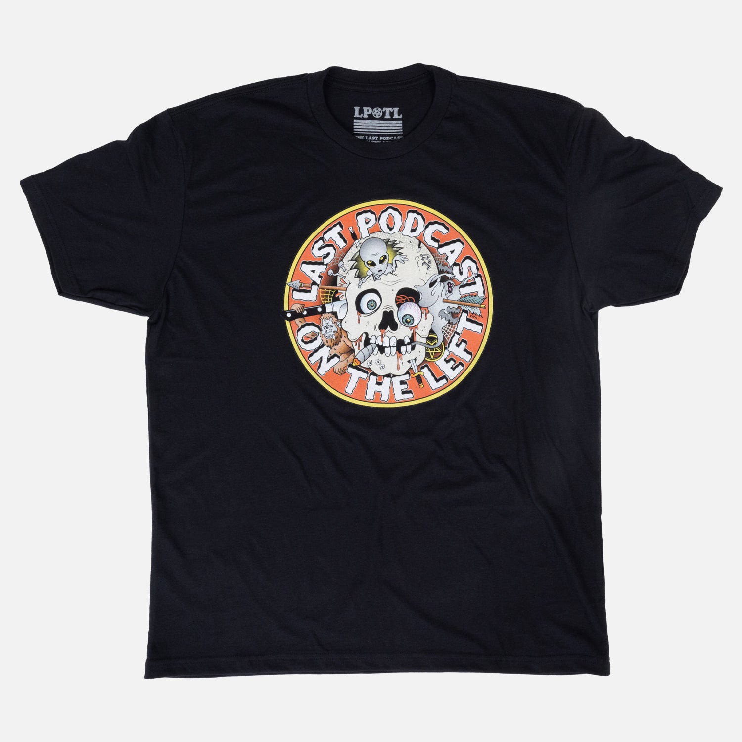 black tee with graphic of skull with orange background surrounded by white text "LAST PODCAST ON THE LEFT"