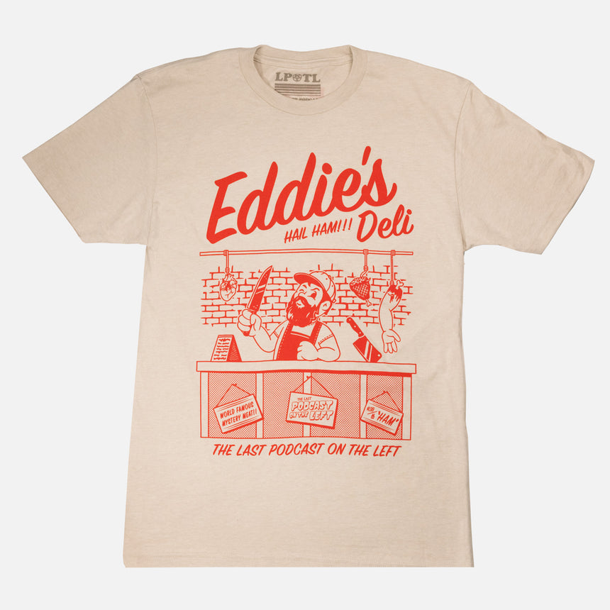 sand tee with graphic of man behind deli counter with red text "Eddie's Deli HAIL HAM!!! THE LAST PODCAST ON THE LEFT"