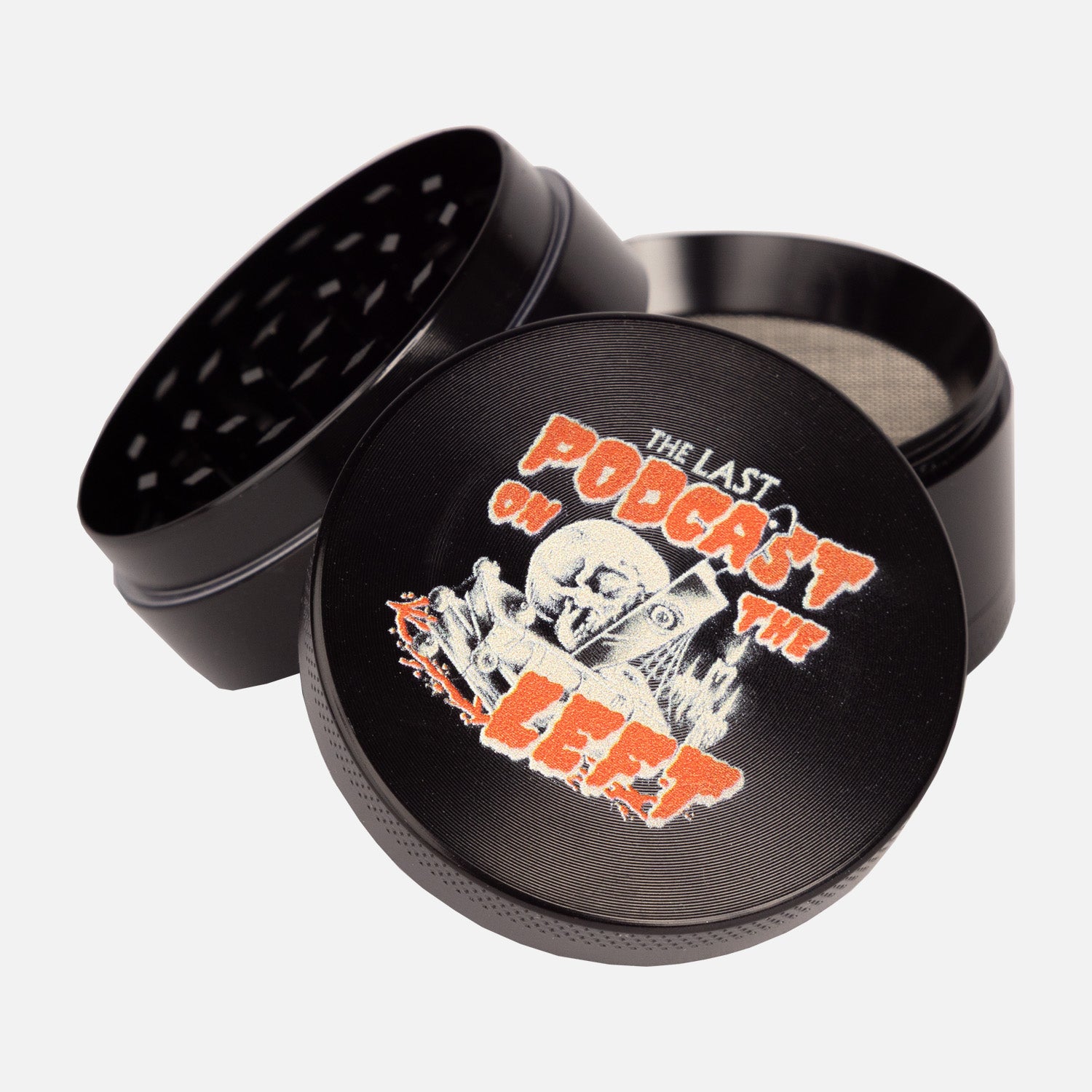 Herb Grinder taken apart showing 3 pieces with "THE LAST PODCAST ON THE LEFT" logo on top
