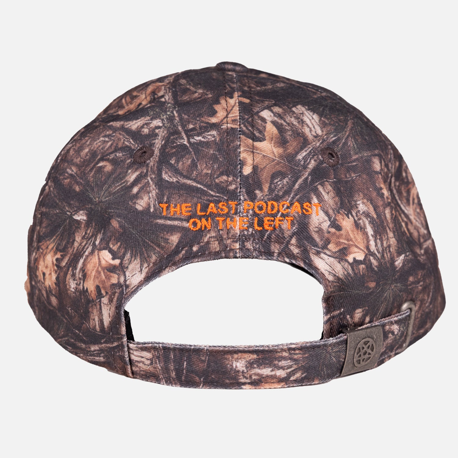 rear view of camo hat with orange text above adjustable back "THE LAST PODCAST ON THE LEFT"