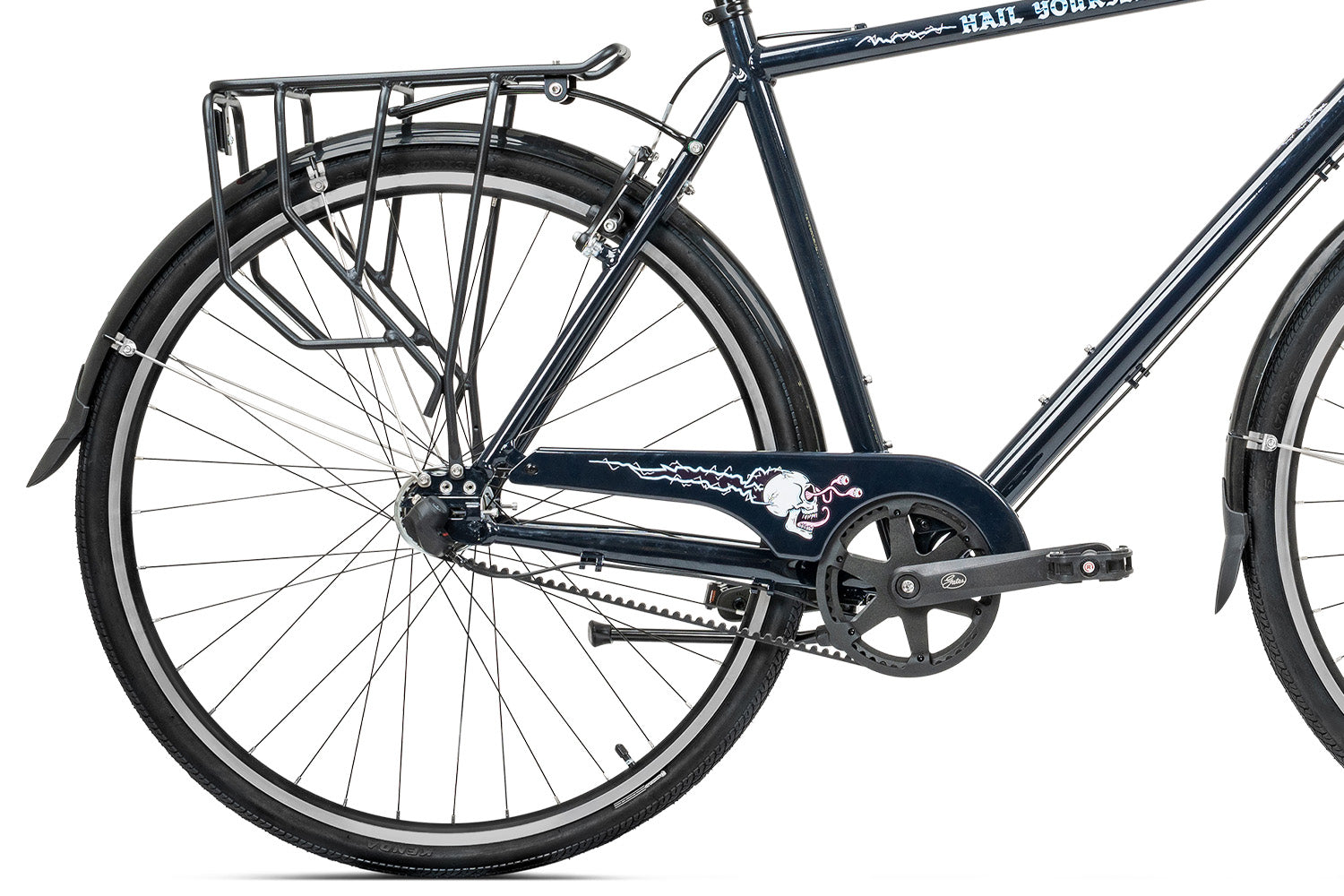 detail photo of chain assembly and rear tire. skull graphic with bulging eyes on chain guard
