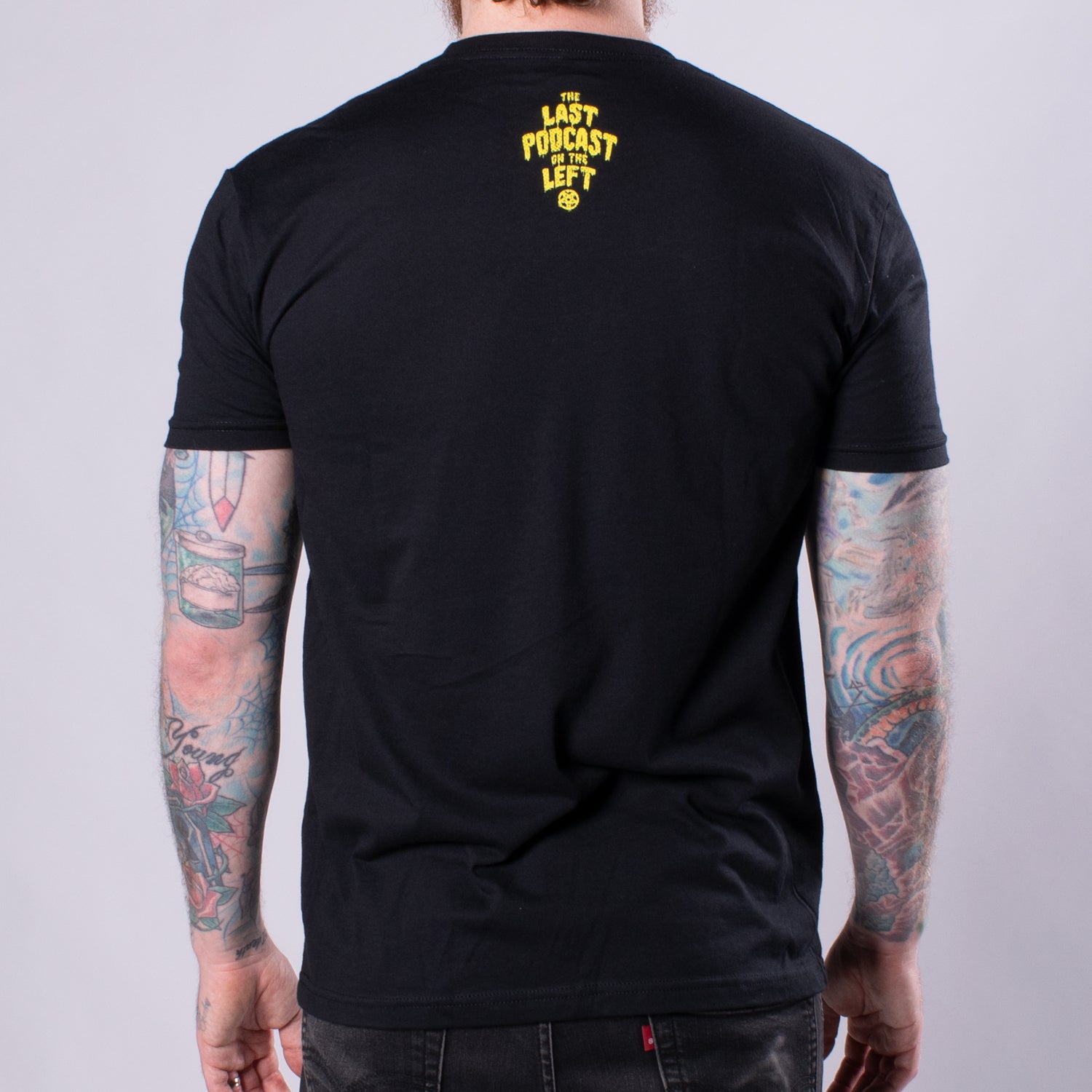 Future Cult Leader Tee man back showing the last podcast on the left text in yellow