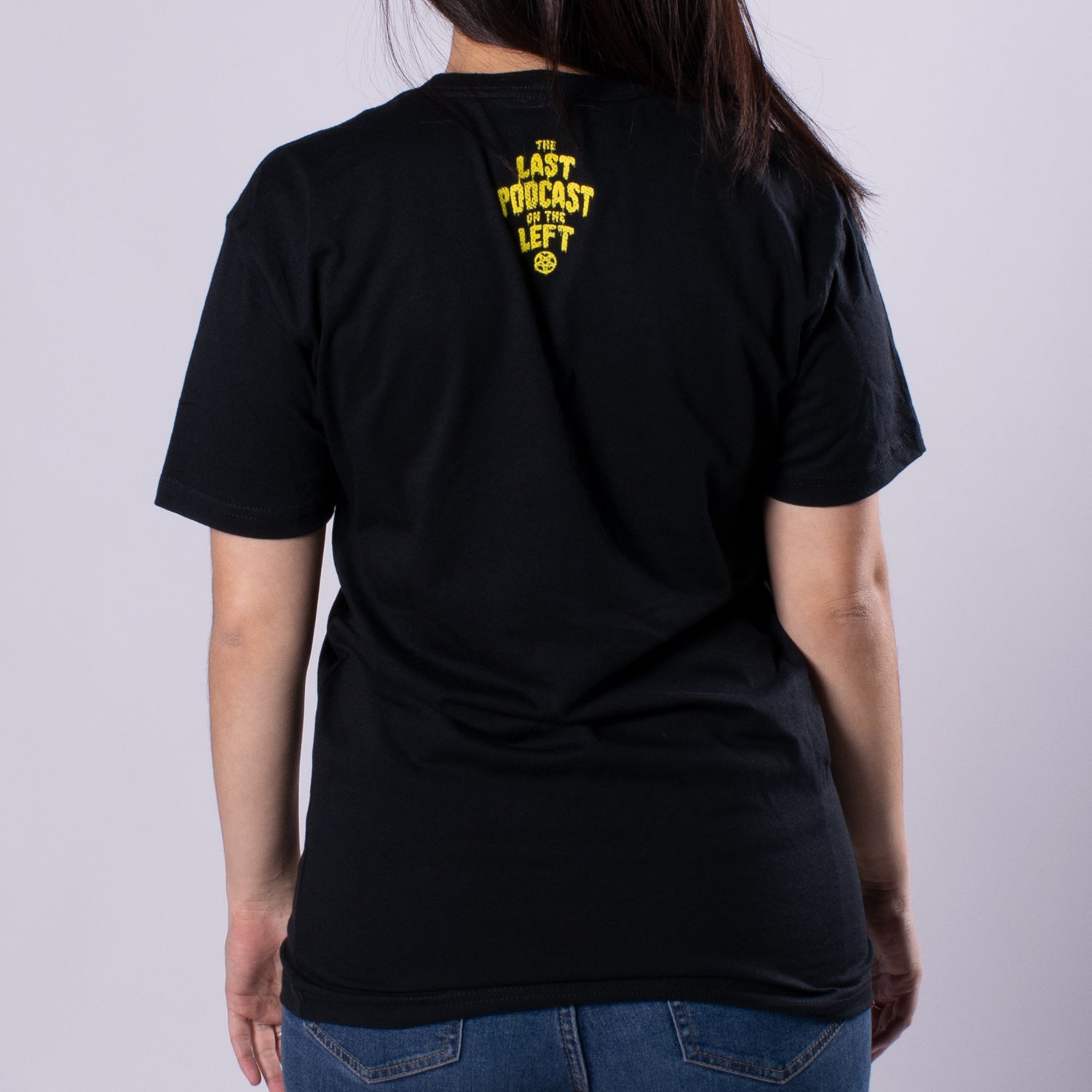 Future Cult Leader Tee woman back showing the last podcast on the left text in yellow