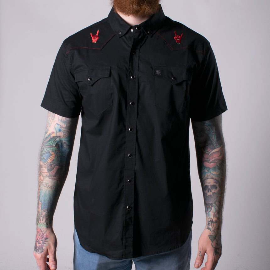 black button down with red hands making horn sign on shoulders