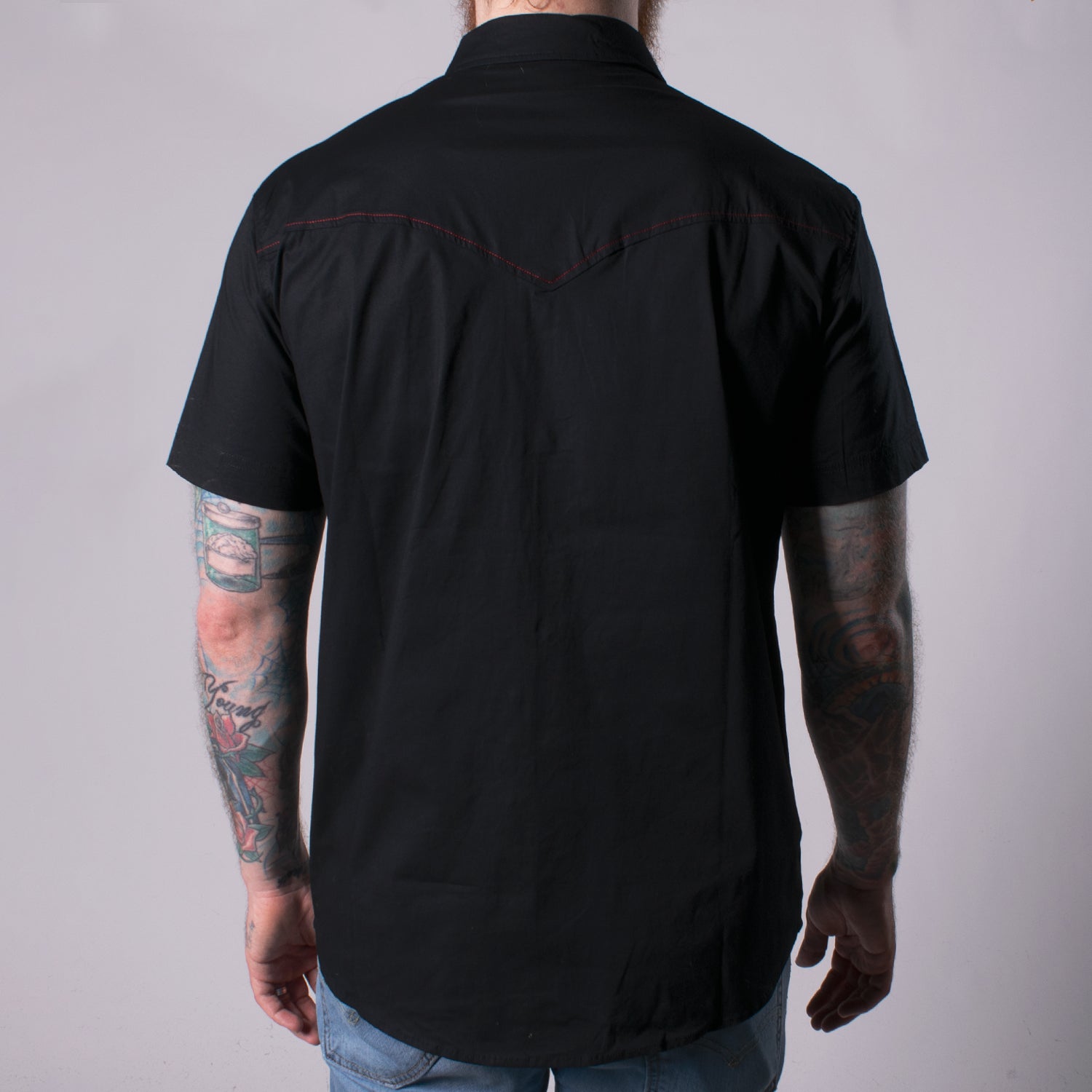 back view of black buttondown