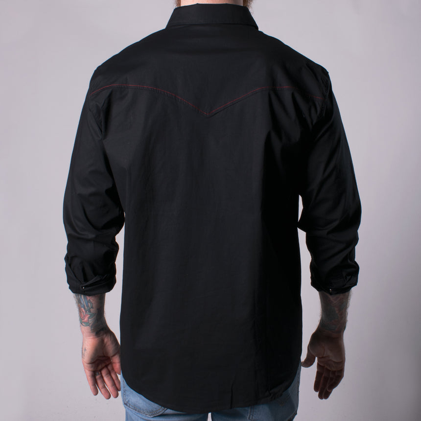long sleeve black buttondown shirt with red hands on shoulders making horn sign