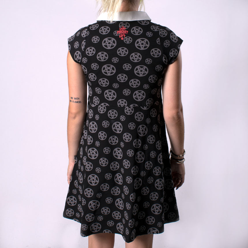 woman in black dress with white color with pentagram print