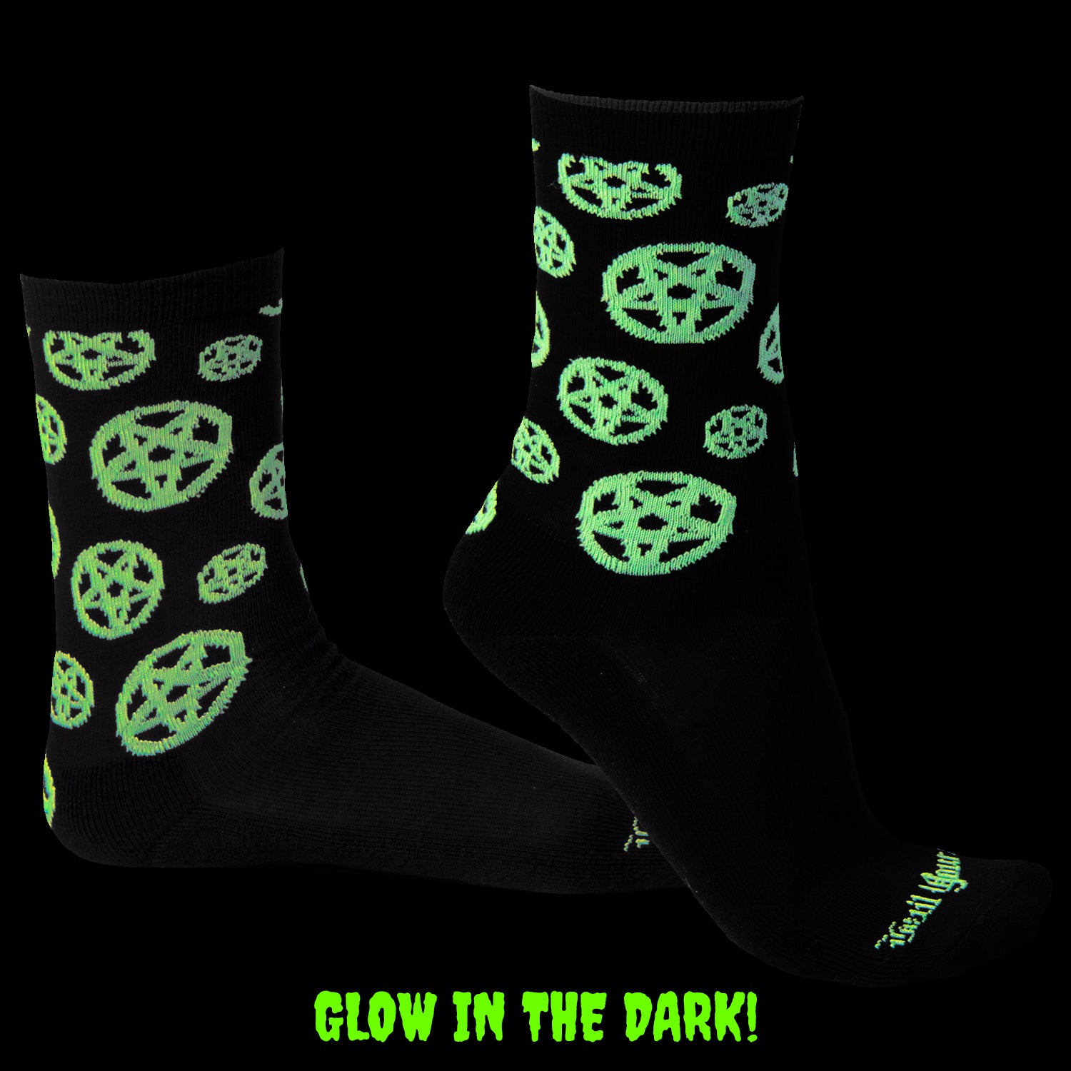 Dark side view of Glow in the dark black socks with white glow in the dark pentagrams on ankle and hail yourself on toes