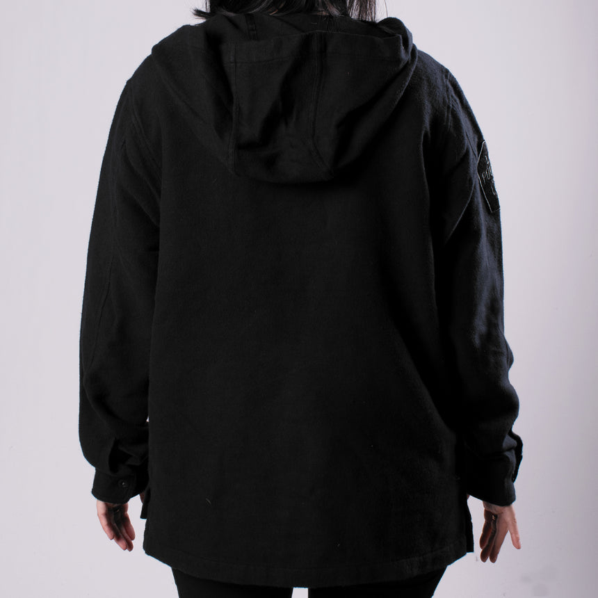 solid black drug rug hoodie on man