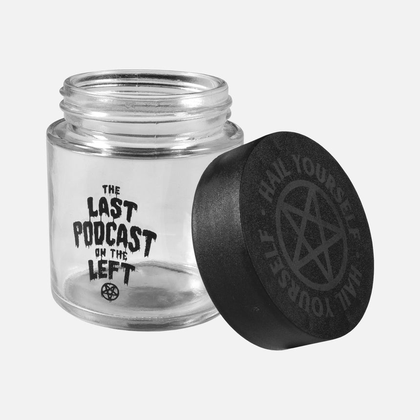 hemoglobin clear jar with pentagram on lid and the last podcast on the left text on jar