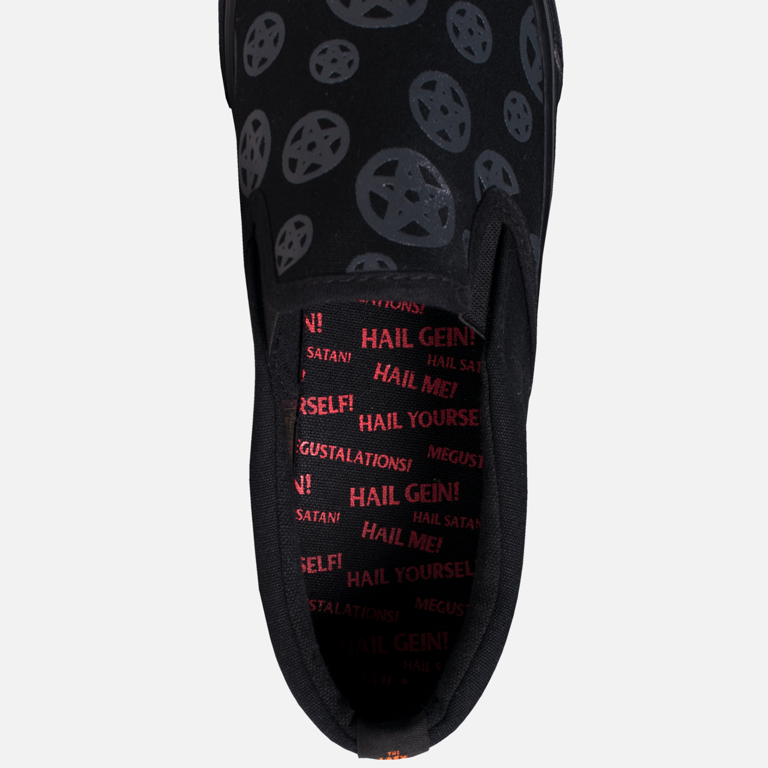 interior of slip on shoe with orange text hail me hail gein hail yourself megustalations hail satan on sole