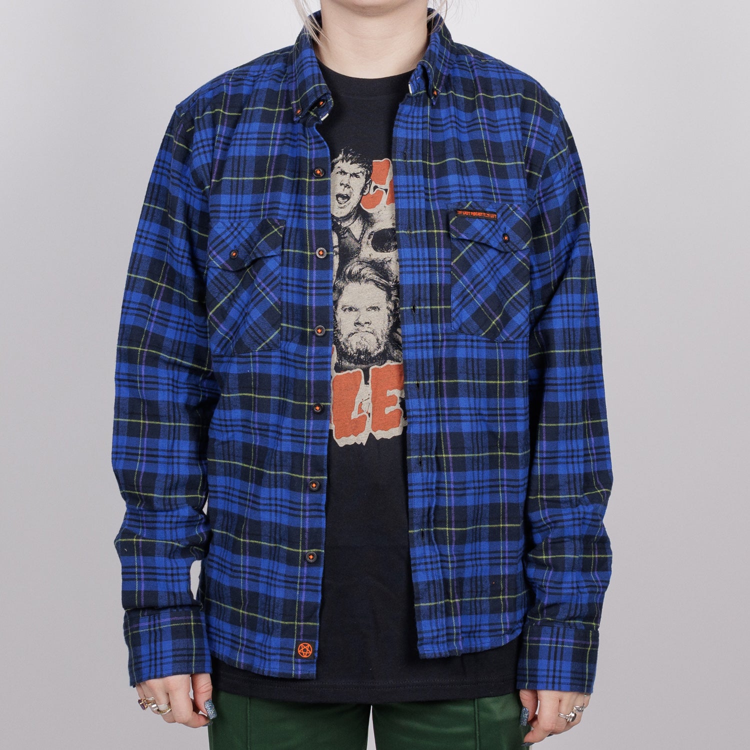 woman in blue plaid flannel buttondown