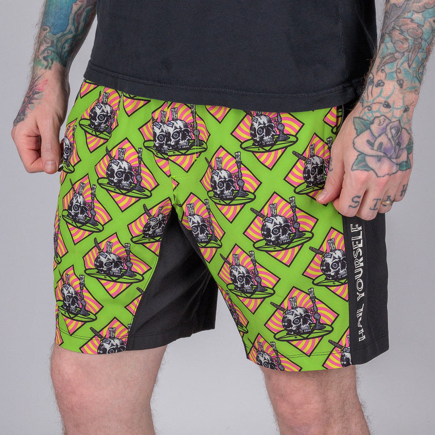 photo of male model wearing 9" gym short in lime green with hail yourself written on side.