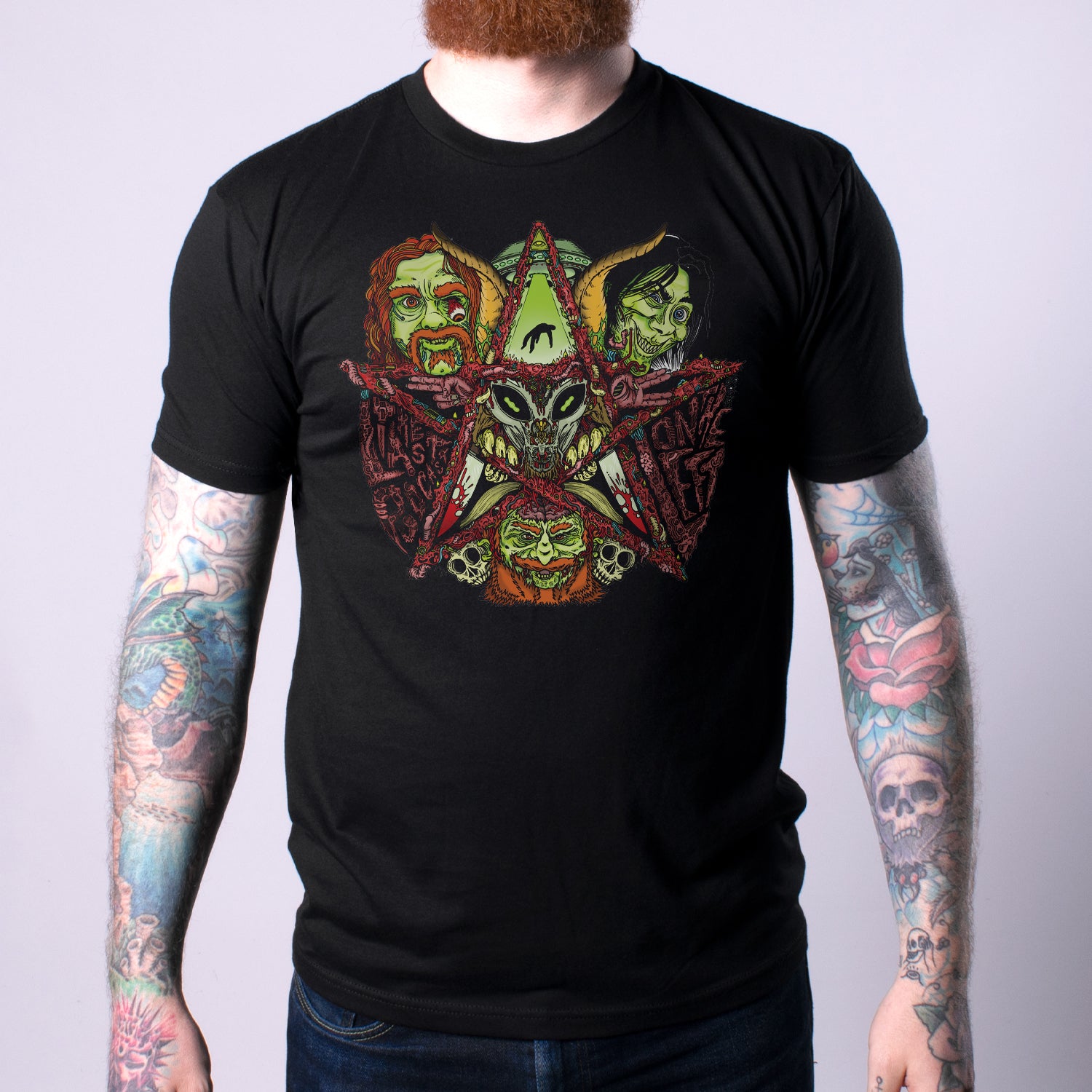 male model posing with biomechanical shirt in black. star design with last podcast on the left team in green