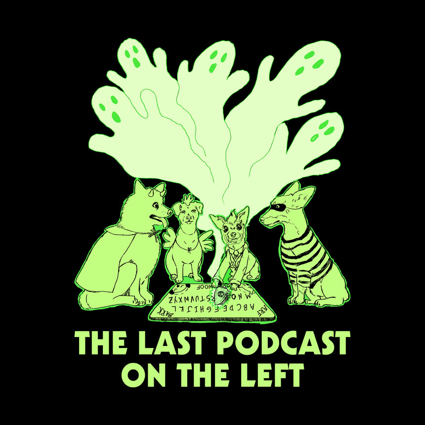 man in black Shirt with green graphic of dogs performing a seance, with green text below "THE LAST PODCAST ON THE LEFT"