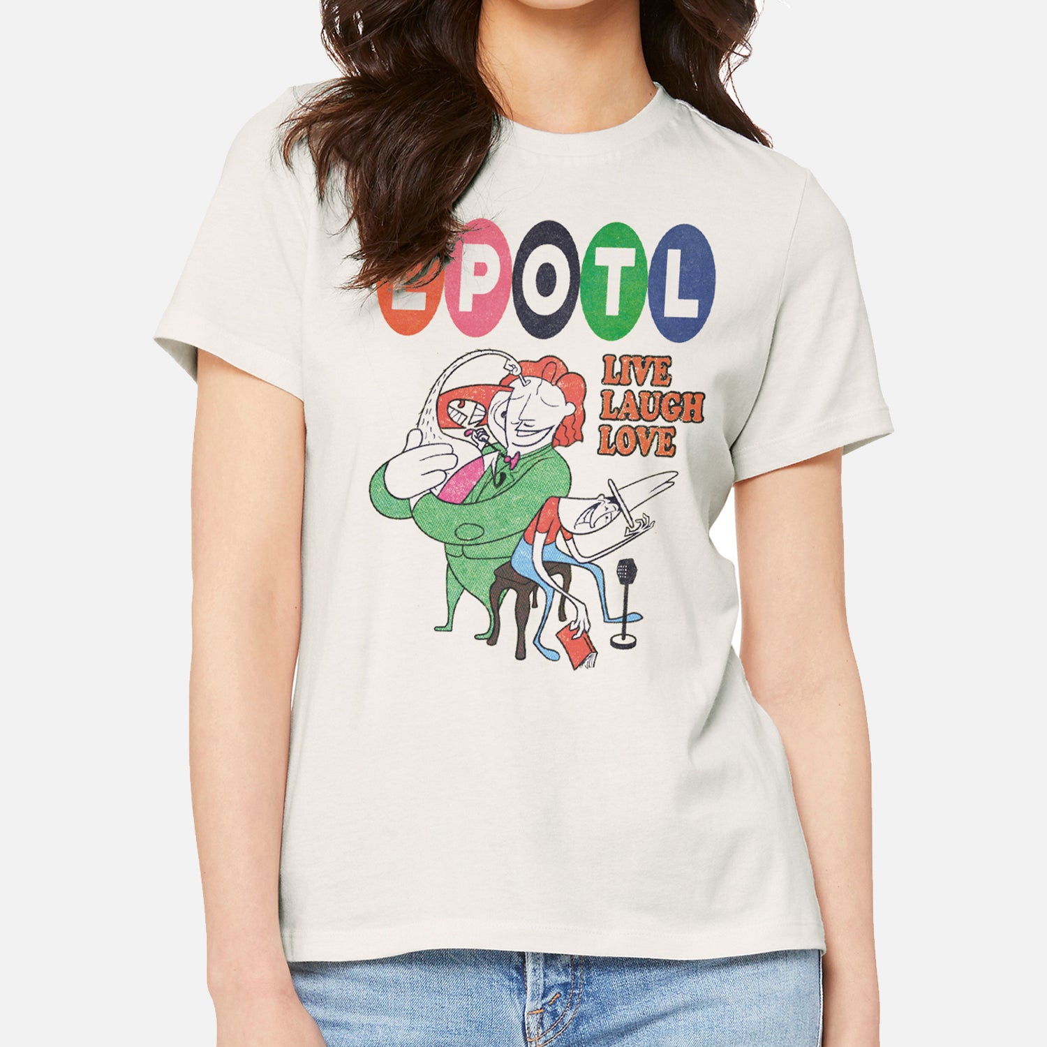 Woman In vintage white shirt with colorful vintage graphic and Text "LPOTL LIVE LAUGH LOVE"