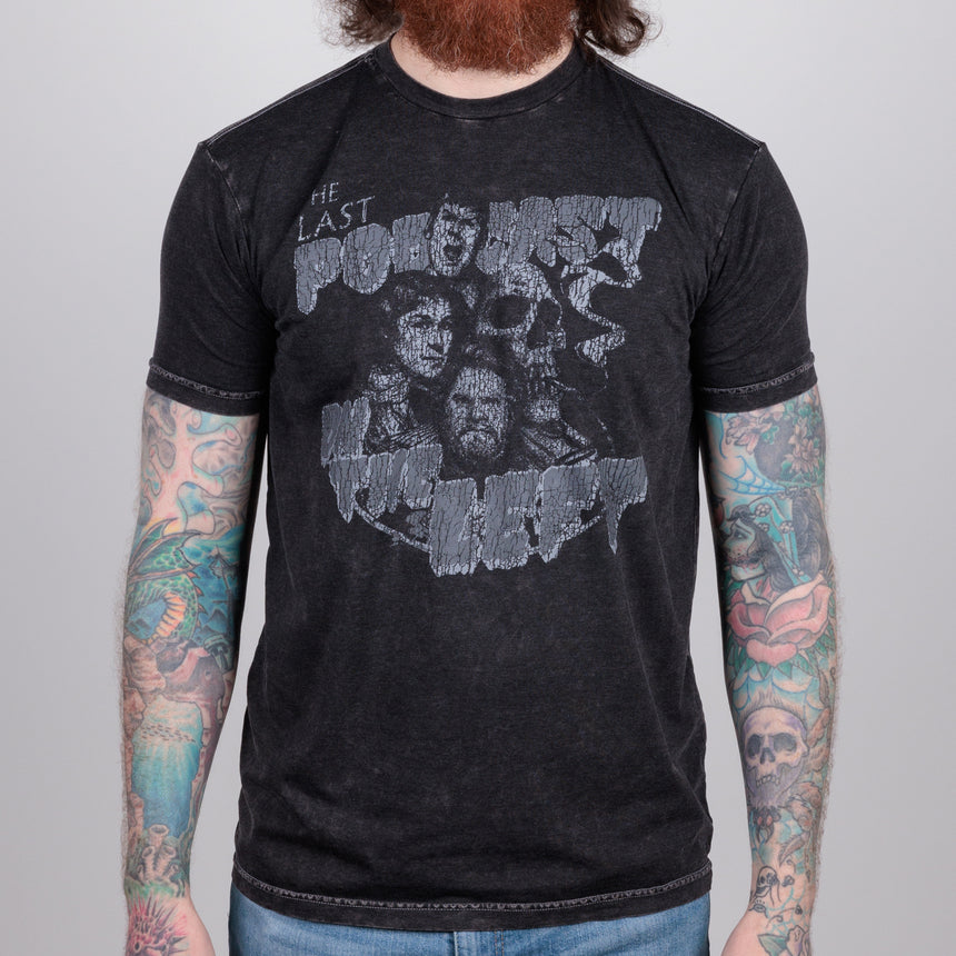 Man in black Vintage-Washed tee with classic greyscale LPOTL logo